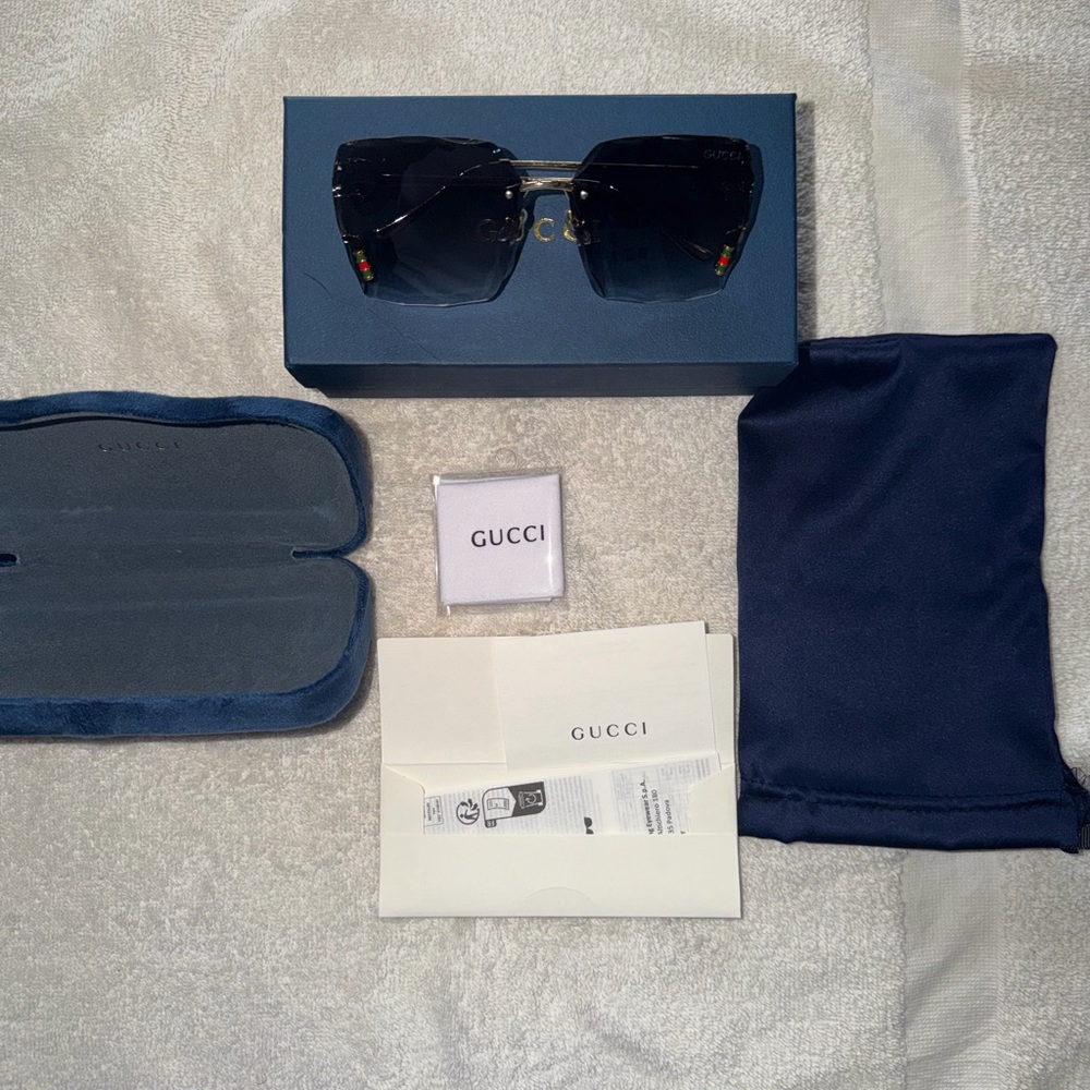 Gucci Sunglasses with Black Gradient Lenses and Gold Hardware